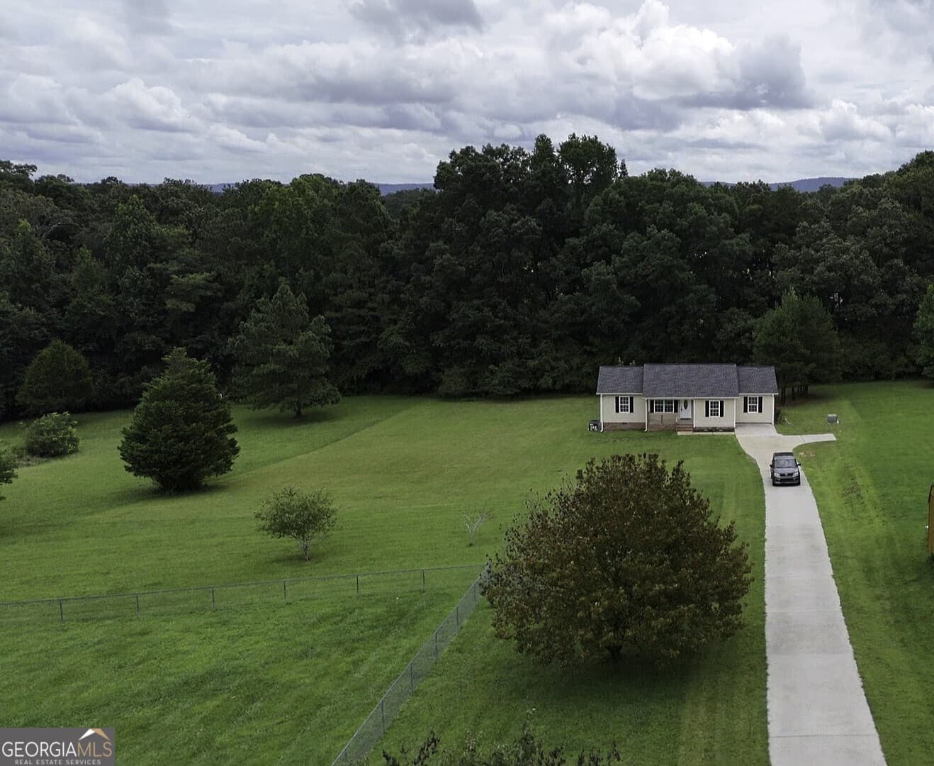 4 bedroom, 3 bathroom, 1,442 sq ft single family residence for sale at 207 Millsap Road, Lafayette, GA 30728 — photo 2