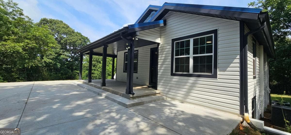 5 bedroom, 2 bathroom, 2,100 sq ft single family residence for sale at 4316 Tanners Mill Road, Braselton, GA 30517 — photo 2