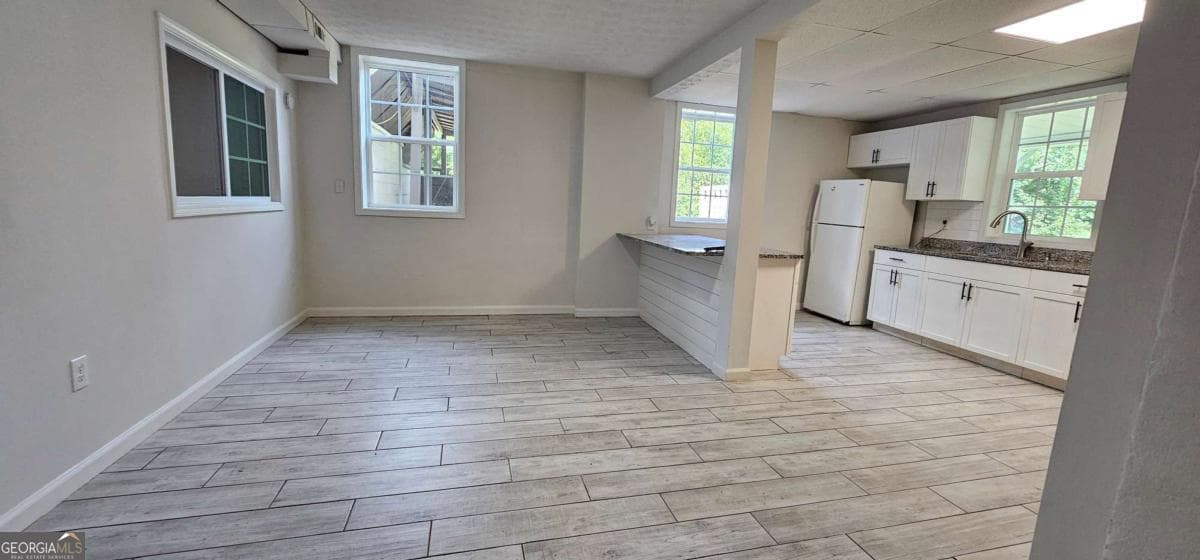 5 bedroom, 2 bathroom, 2,100 sq ft single family residence for sale at 4316 Tanners Mill Road, Braselton, GA 30517 — photo 7