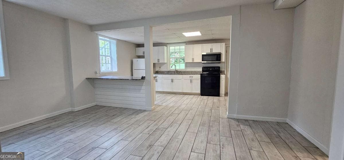 5 bedroom, 2 bathroom, 2,100 sq ft single family residence for sale at 4316 Tanners Mill Road, Braselton, GA 30517 — photo 10