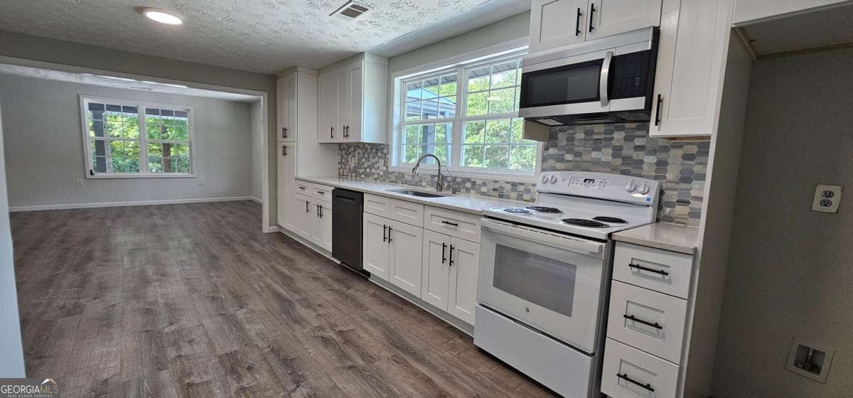 5 bedroom, 2 bathroom, 2,100 sq ft single family residence for sale at 4316 Tanners Mill Road, Braselton, GA 30517 — photo 8