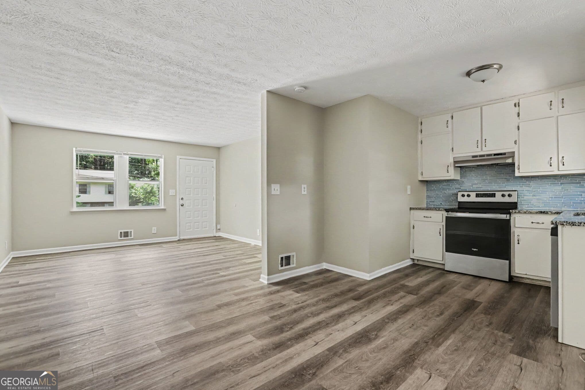 3 bedroom, 2 bathroom, 1,050 sq ft single family residence for sale at 2541 Kelly Lake Drive, Decatur, GA 30032 — photo 3