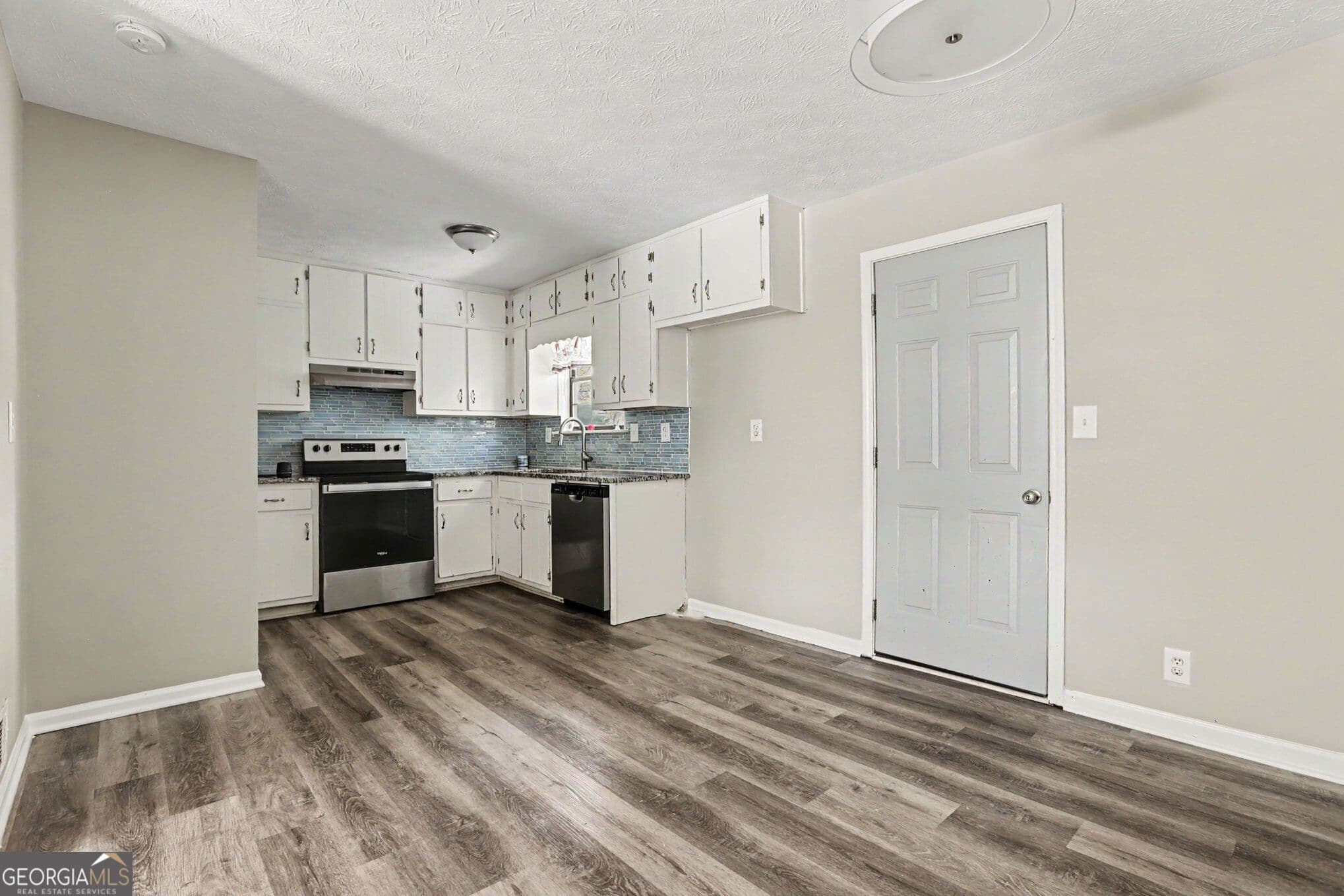 3 bedroom, 2 bathroom, 1,050 sq ft single family residence for sale at 2541 Kelly Lake Drive, Decatur, GA 30032 — photo 4