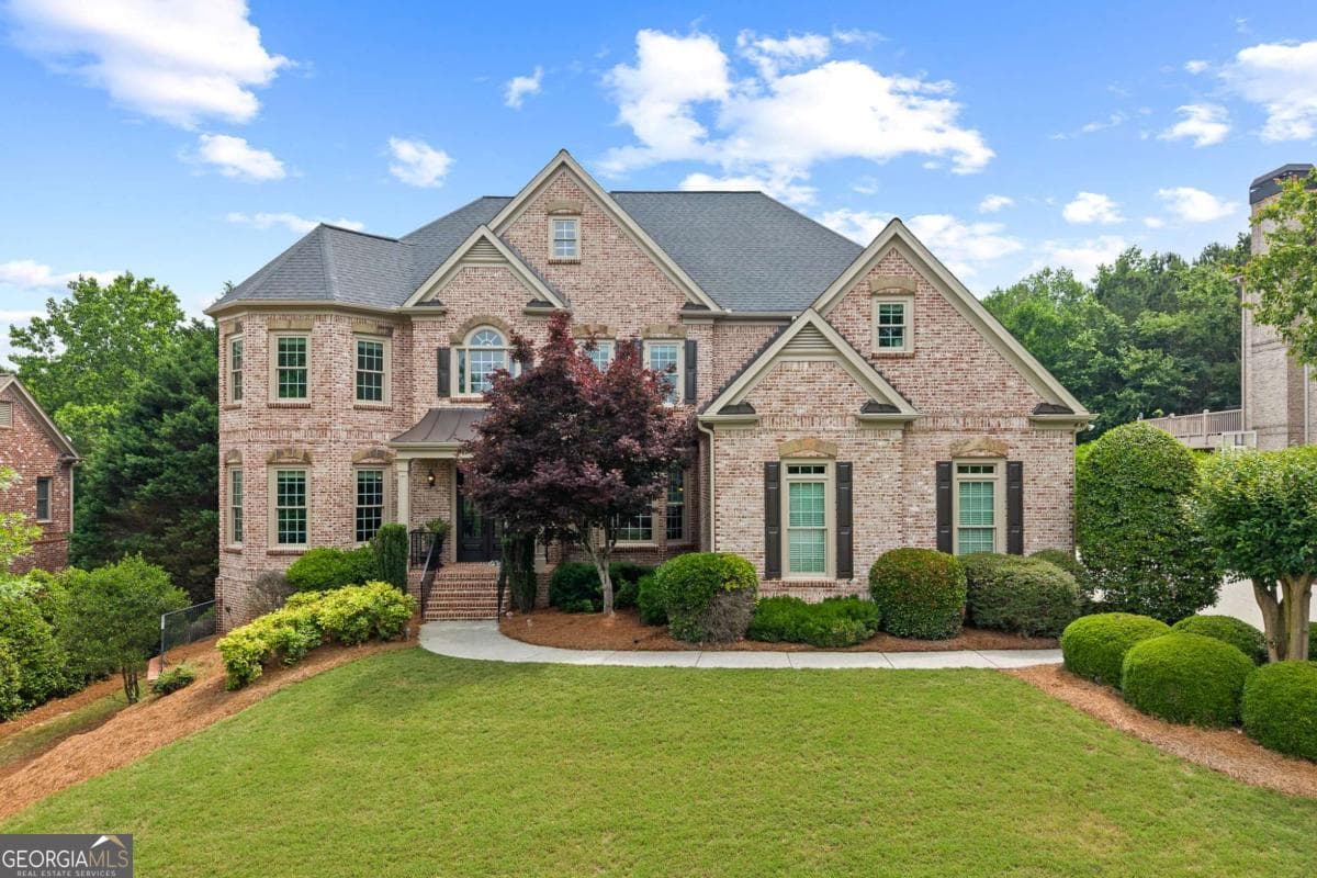 6 bedroom, 5 bathroom, 6,091 sq ft single family residence sold at 1068 Windermere Crossing, Cumming, GA 30041