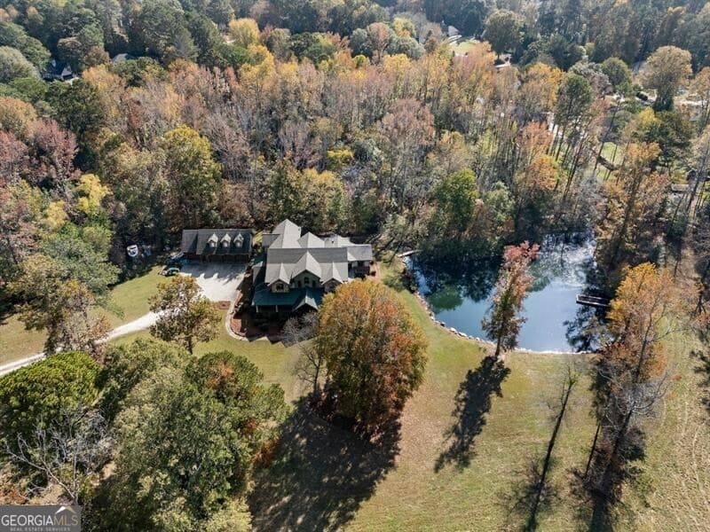 5 bedroom, 4 bathroom, 7,932 sq ft single family residence for sale at 5185 Buice Road, Alpharetta, GA 30022 — photo 2