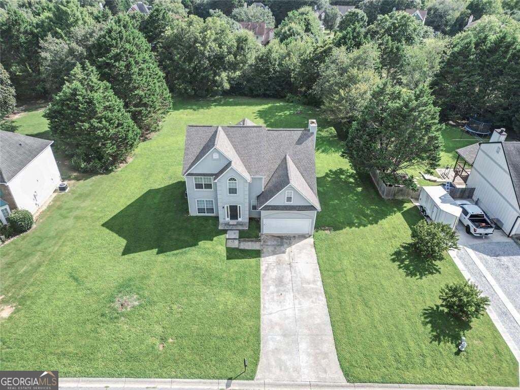 4 bedroom, 2.5 bathroom, 2,692 sq ft single family residence for sale at 1070 Big Haynes Drive, Grayson, GA 30017 — photo 2