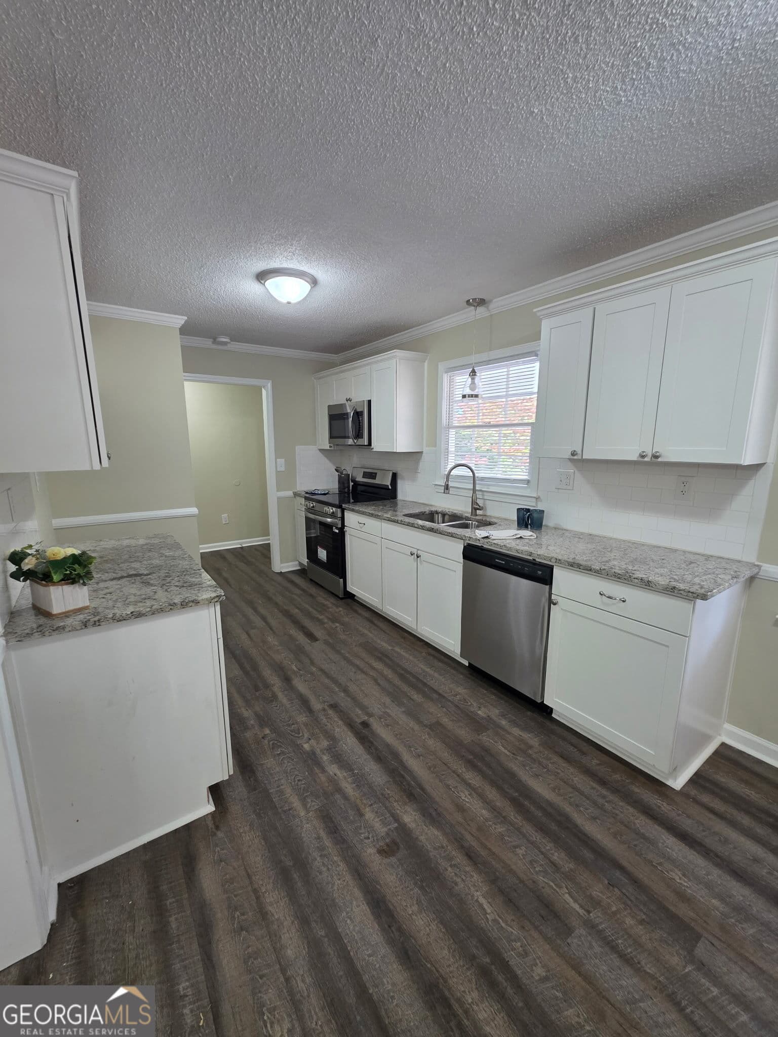 4 bedroom, 2.5 bathroom, 2,312 sq ft single family residence for sale at 1040 Carol Drive, Watkinsville, GA 30677 — photo 3