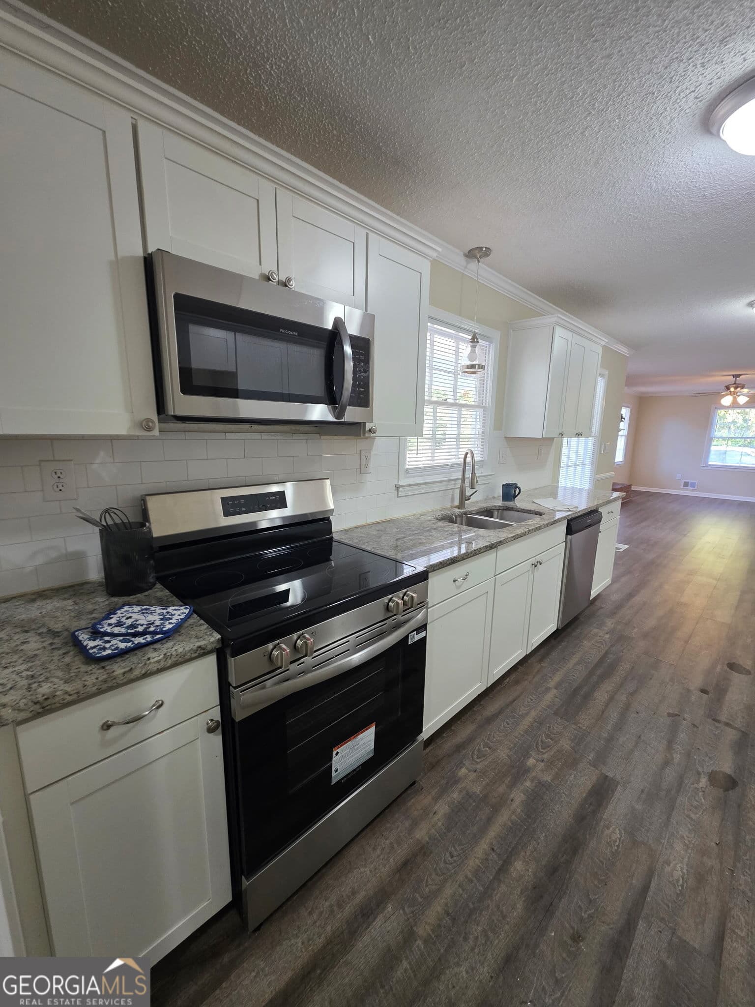 4 bedroom, 2.5 bathroom, 2,312 sq ft single family residence for sale at 1040 Carol Drive, Watkinsville, GA 30677 — photo 4