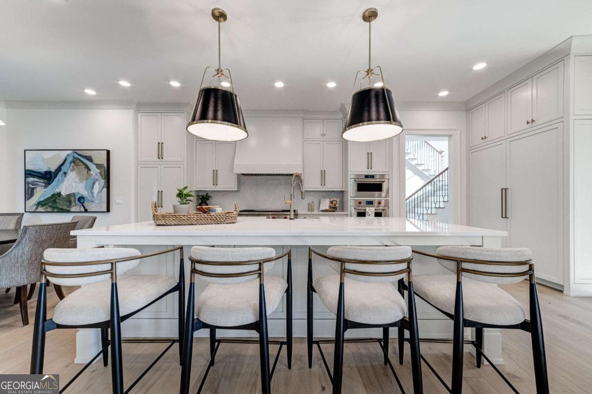 4 bedroom, 4.5 bathroom, 4,089 sq ft single family residence for sale at 4585 Ryker Road, Cumming, GA 30041 — photo 5