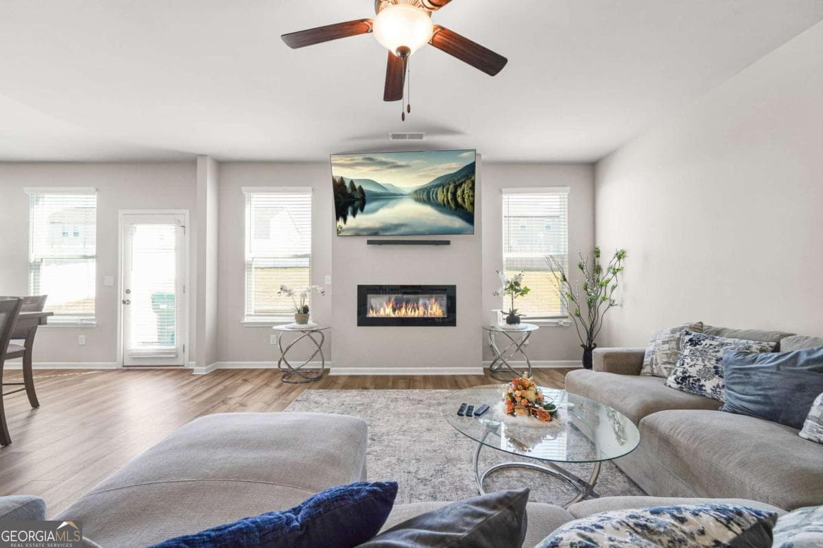 5 bedroom, 3 bathroom, 3,138 sq ft single family residence for sale at 1729 Cadence Street, Locust Grove, GA 30248 — photo 8