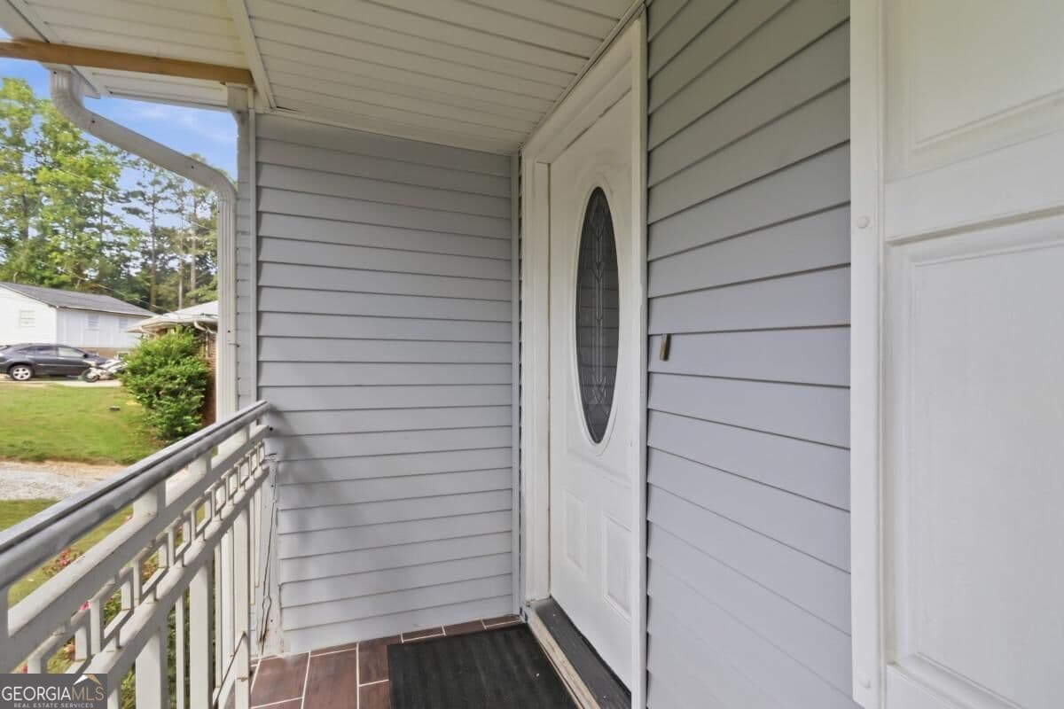 6 bedroom, 4 bathroom, 1,148 sq ft single family residence for sale at 1594 Dellwood Circle, Morrow, GA 30260 — photo 4
