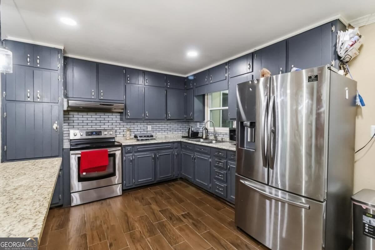 6 bedroom, 4 bathroom, 1,148 sq ft single family residence for sale at 1594 Dellwood Circle, Morrow, GA 30260 — photo 8