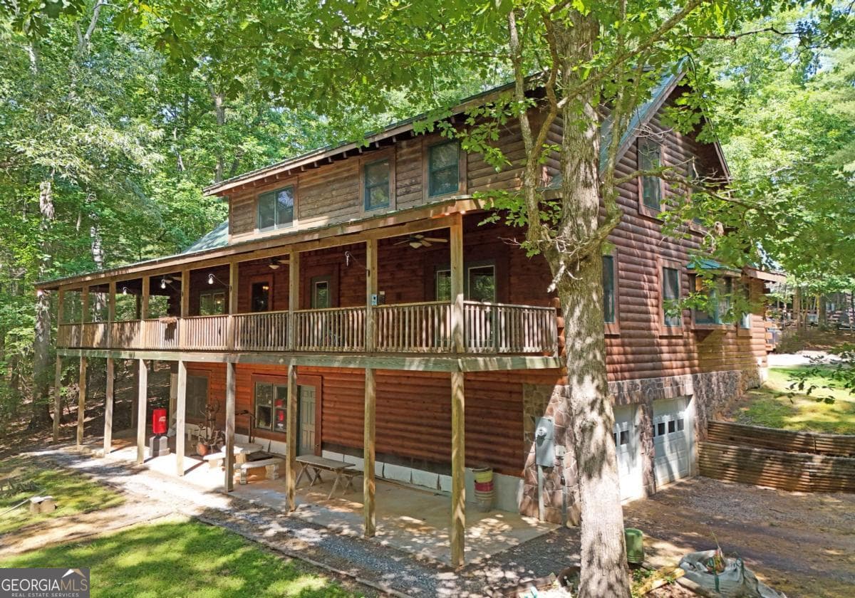 4 bedroom, 2 bathroom, 5,408 sq ft cabin,single family residence for sale at 84 Saddle Ridge Court, Blairsville, GA 30512 — photo 2