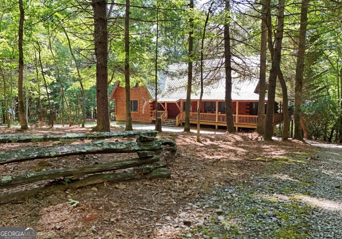 4 bedroom, 2 bathroom, 5,408 sq ft cabin,single family residence for sale at 84 Saddle Ridge Court, Blairsville, GA 30512 — photo 7