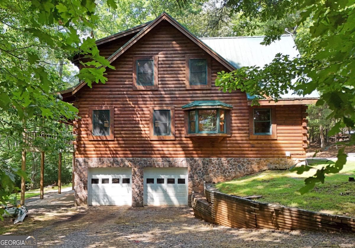 4 bedroom, 2 bathroom, 5,408 sq ft cabin,single family residence for sale at 84 Saddle Ridge Court, Blairsville, GA 30512 — photo 3
