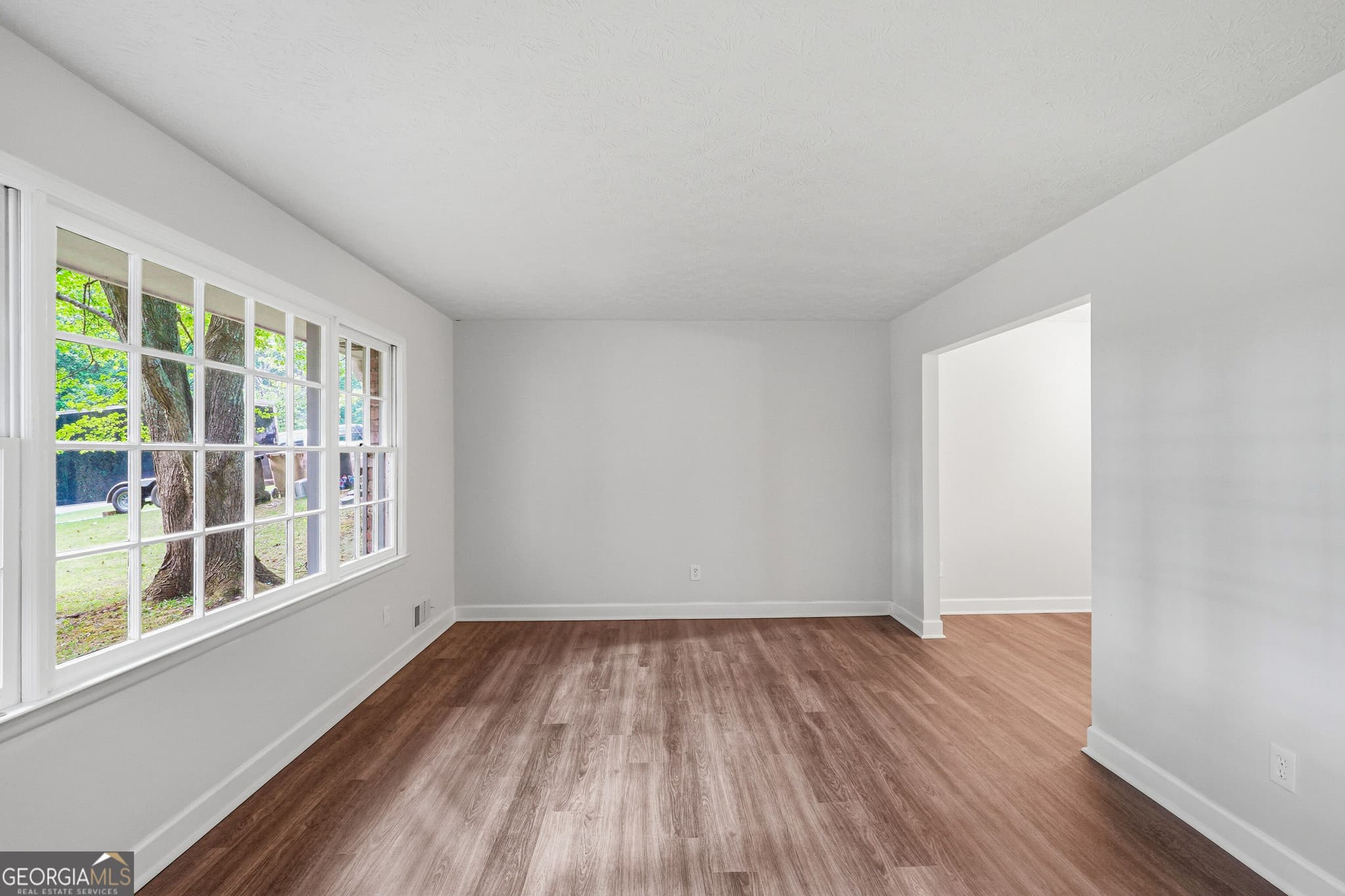 4 bedroom, 2 bathroom, 1,967 sq ft single family residence for sale at 7052 Lodgepole Drive, Morrow, GA 30260 — photo 3