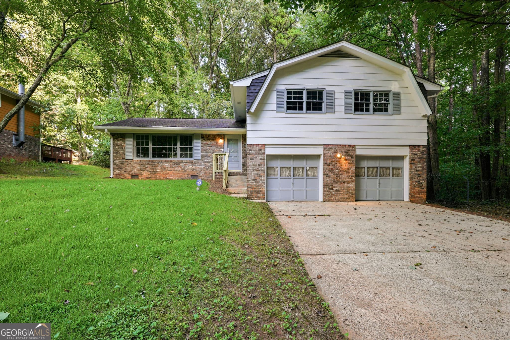 4 bedroom, 2 bathroom, 1,967 sq ft single family residence for sale at 7052 Lodgepole Drive, Morrow, GA 30260 — photo 1 of 26