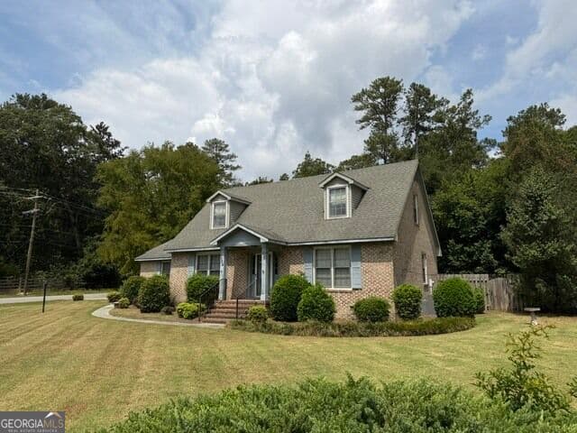 4 bedroom, 2 bathroom, 1,482 sq ft single family residence for sale at 324 Lumpkin Street, Thomson, GA 30824 — photo 3
