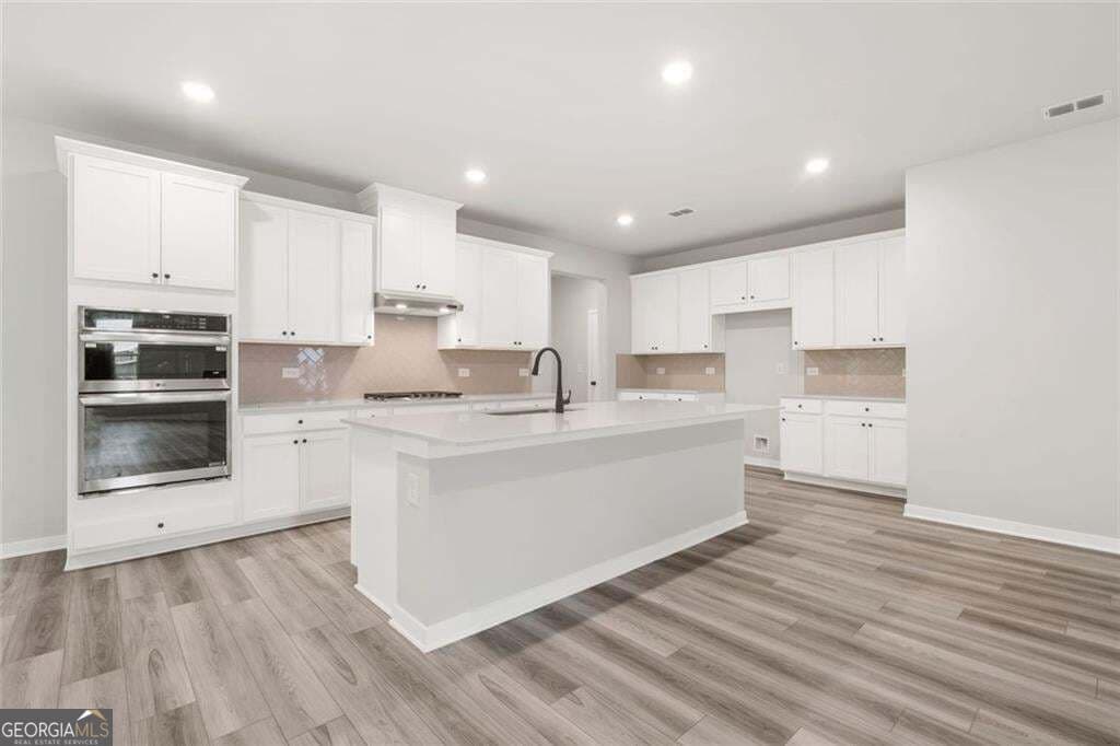 5 bedroom, 4 bathroom, 3,704 sq ft single family residence for sale at 405 Amberleaf Cove, Mcdonough, GA 30252 — photo 7