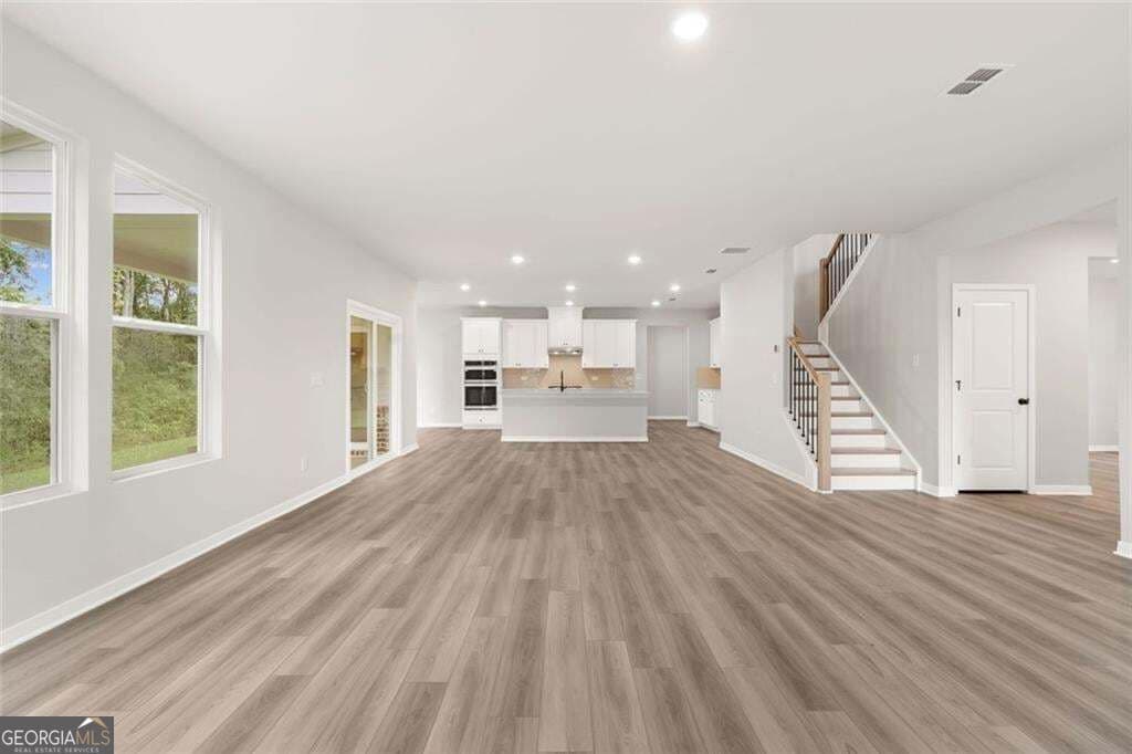 5 bedroom, 4 bathroom, 3,704 sq ft single family residence for sale at 405 Amberleaf Cove, Mcdonough, GA 30252 — photo 5