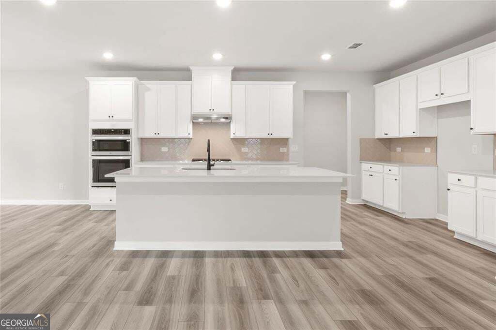 5 bedroom, 4 bathroom, 3,704 sq ft single family residence for sale at 405 Amberleaf Cove, Mcdonough, GA 30252 — photo 9