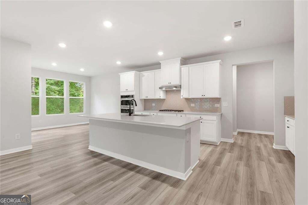 5 bedroom, 4 bathroom, 3,704 sq ft single family residence for sale at 405 Amberleaf Cove, Mcdonough, GA 30252 — photo 8