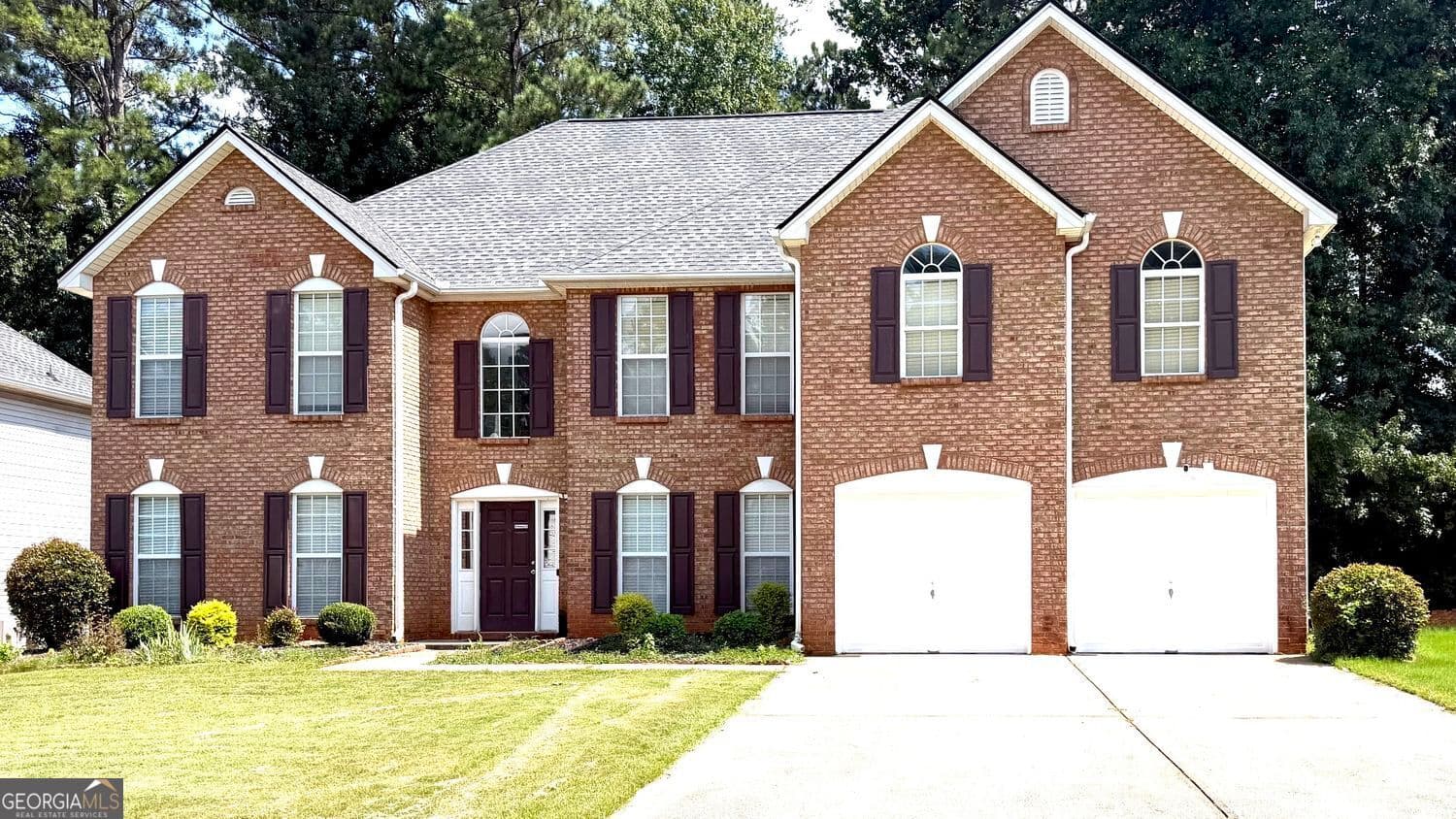 5 bedroom, 4 bathroom, 3,907 sq ft single family residence for sale at 3070 Emden Trail, Snellville, GA 30039 — photo 2