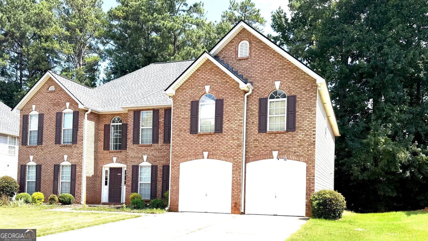 5 bedroom, 4 bathroom, 3,907 sq ft single family residence for sale at 3070 Emden Trail, Snellville, GA 30039 — photo 4