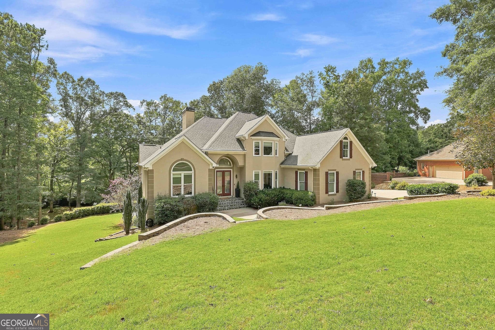 5 bedroom, 4.5 bathroom, 5,884 sq ft single family residence for sale at 265 Broadmoor Drive, Fayetteville, GA 30215 — photo 3