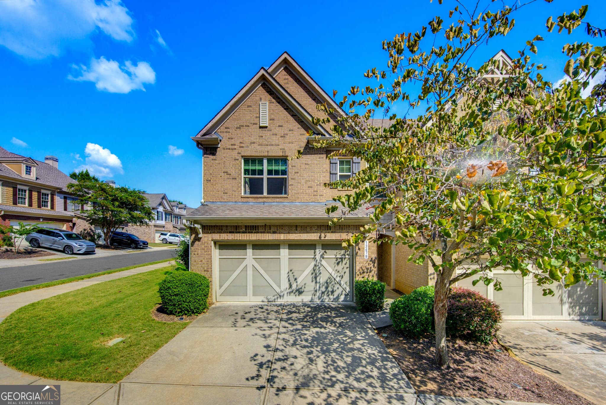 5 bedroom, 3.5 bathroom, 2,183 sq ft townhouse for sale at 13479 Gardiner Lane, Milton, GA 30004 — photo 1 of 37