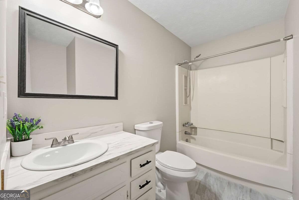 4 bedroom, 2 bathroom, 1,325 sq ft single family residence for sale at 125 Pleasant Valley Road, Mcdonough, GA 30253 — photo 6