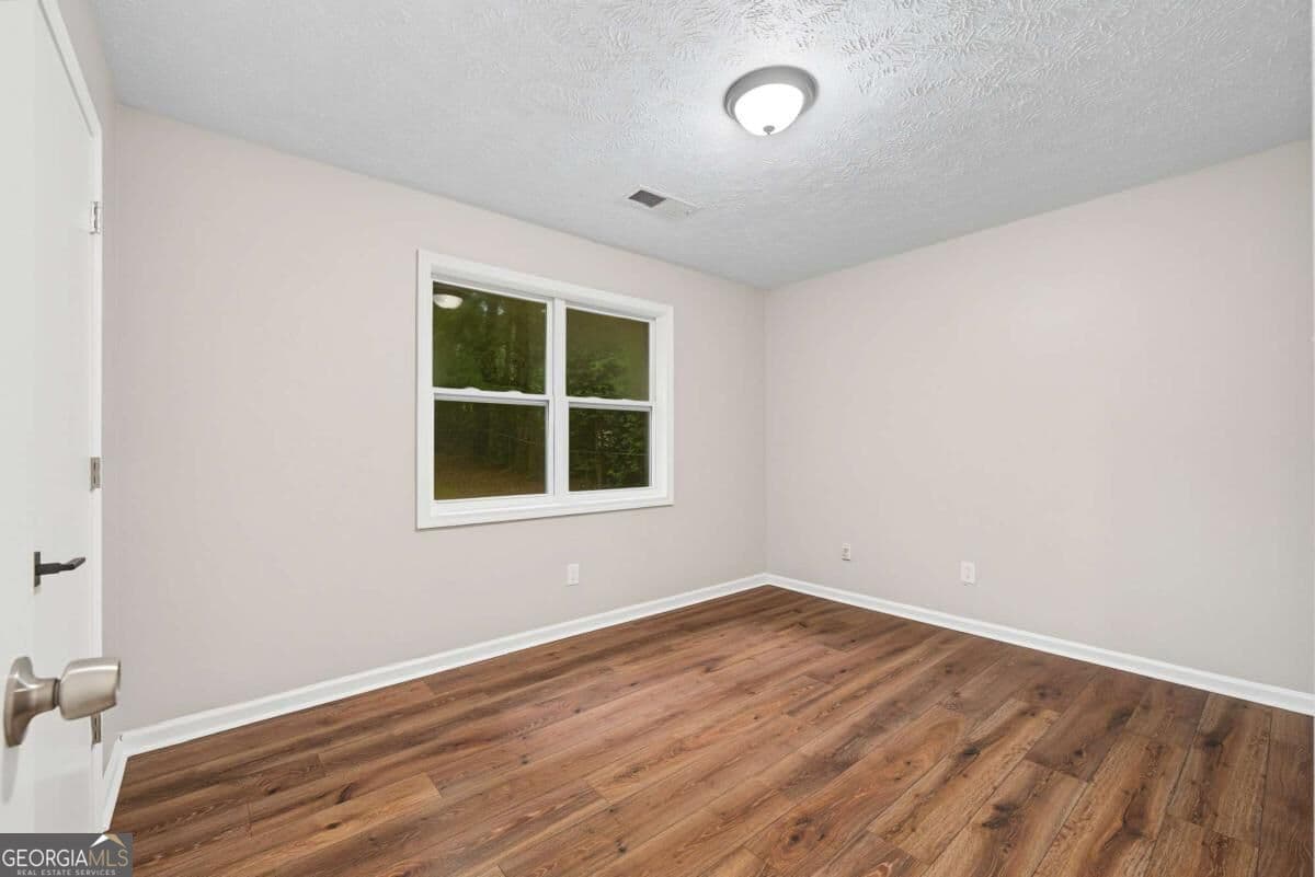 4 bedroom, 2 bathroom, 1,325 sq ft single family residence for sale at 125 Pleasant Valley Road, Mcdonough, GA 30253 — photo 9