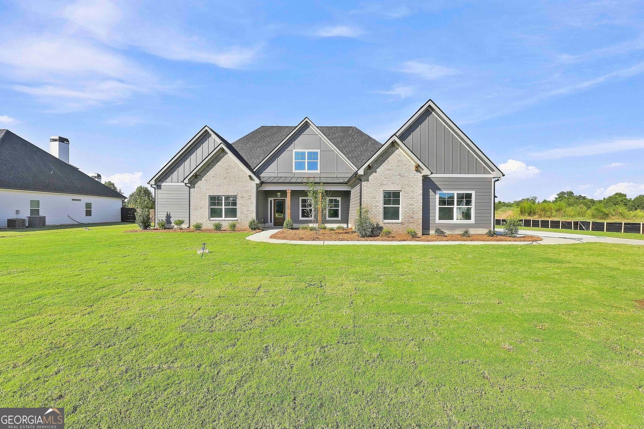 5 bedroom, 4 bathroom, 3,662 sq ft single family residence for sale at 348 Grove Park LOT 21, Senoia, GA 30276 — photo 1 of 42