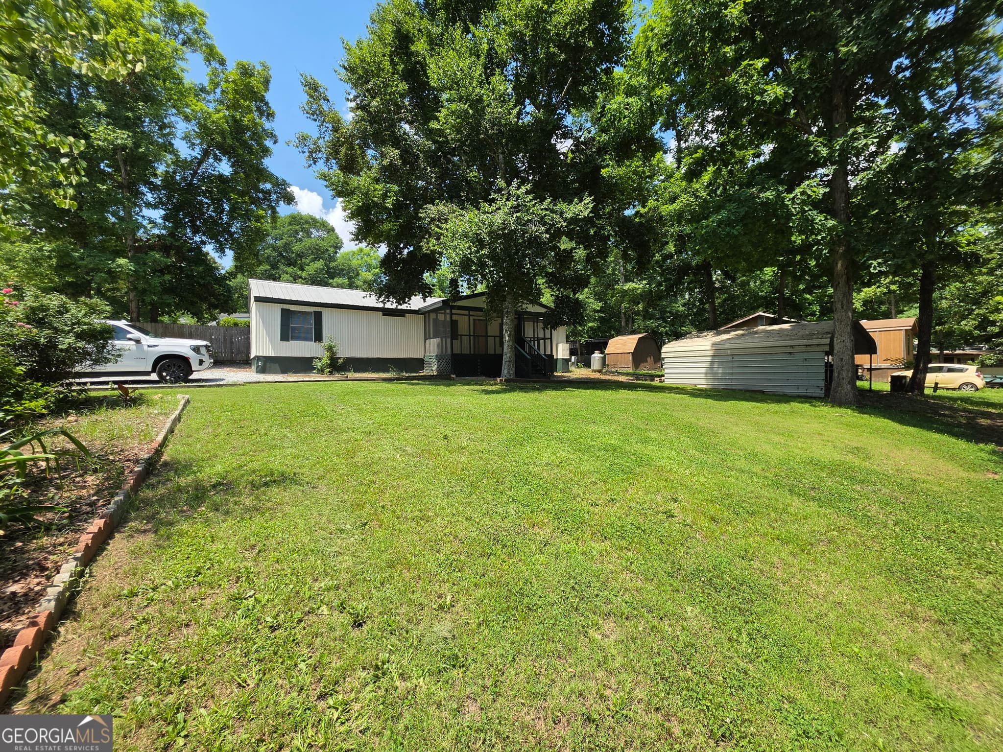 2 bedroom, 1 bathroom, 784 sq ft manufactured home,single family residence for sale at 109 Oconee Circle, Eatonton, GA 31024 — photo 2
