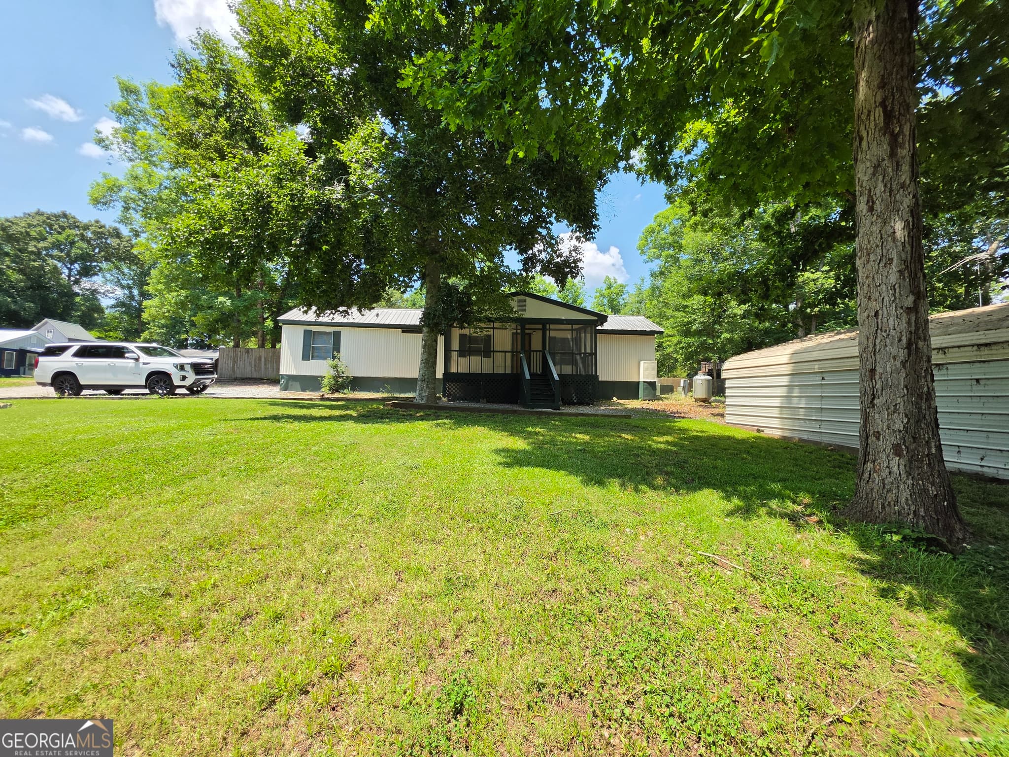 2 bedroom, 1 bathroom, 784 sq ft manufactured home,single family residence for sale at 109 Oconee Circle, Eatonton, GA 31024 — photo 3
