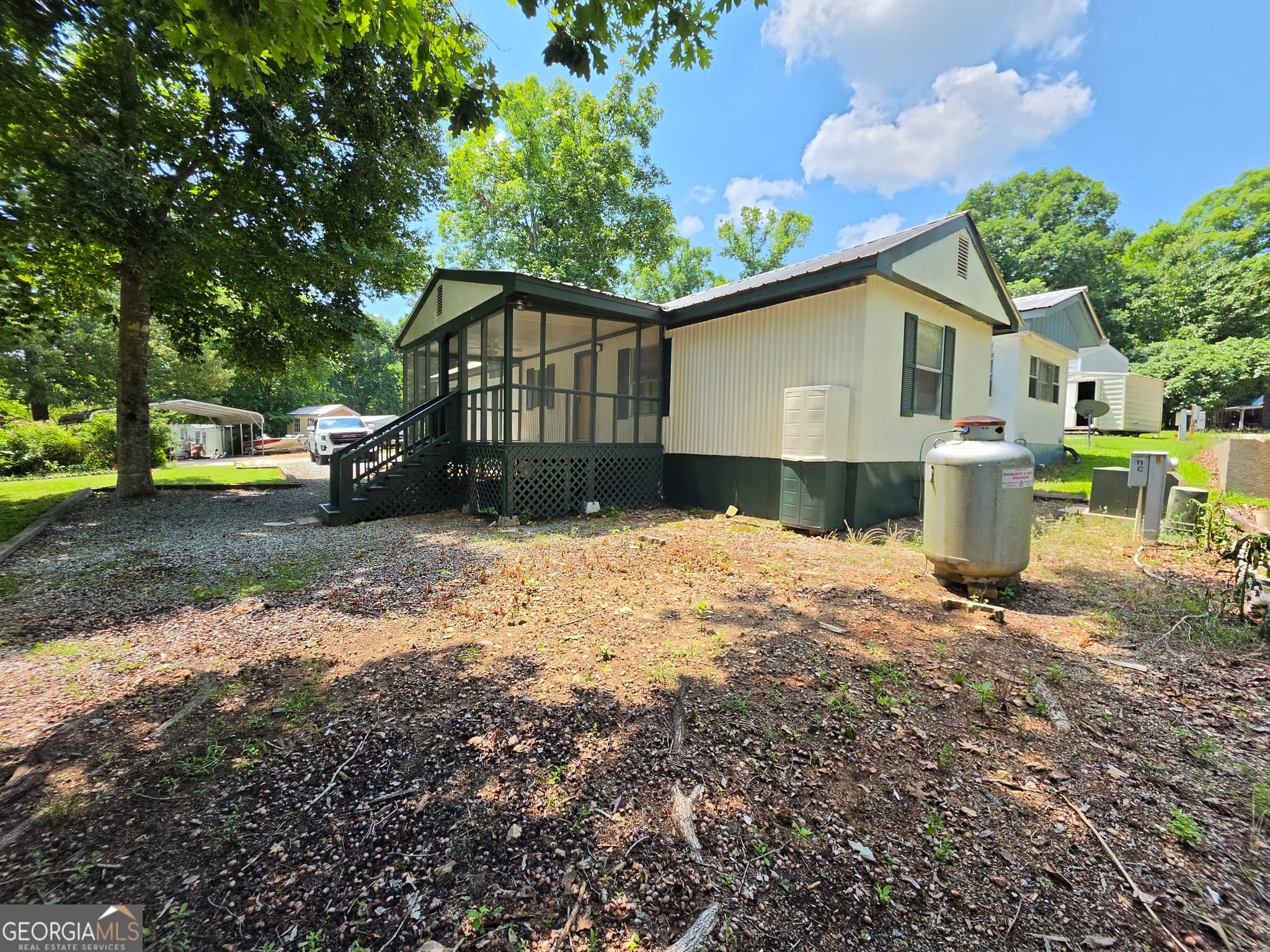 2 bedroom, 1 bathroom, 784 sq ft manufactured home,single family residence for sale at 109 Oconee Circle, Eatonton, GA 31024 — photo 5
