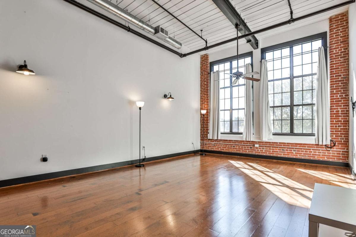 1 bedroom, 1.5 bathroom, 1,072 sq ft loft,condominium for sale at 1261 CAROLINE Street 211, Atlanta, GA 30307 — photo 2