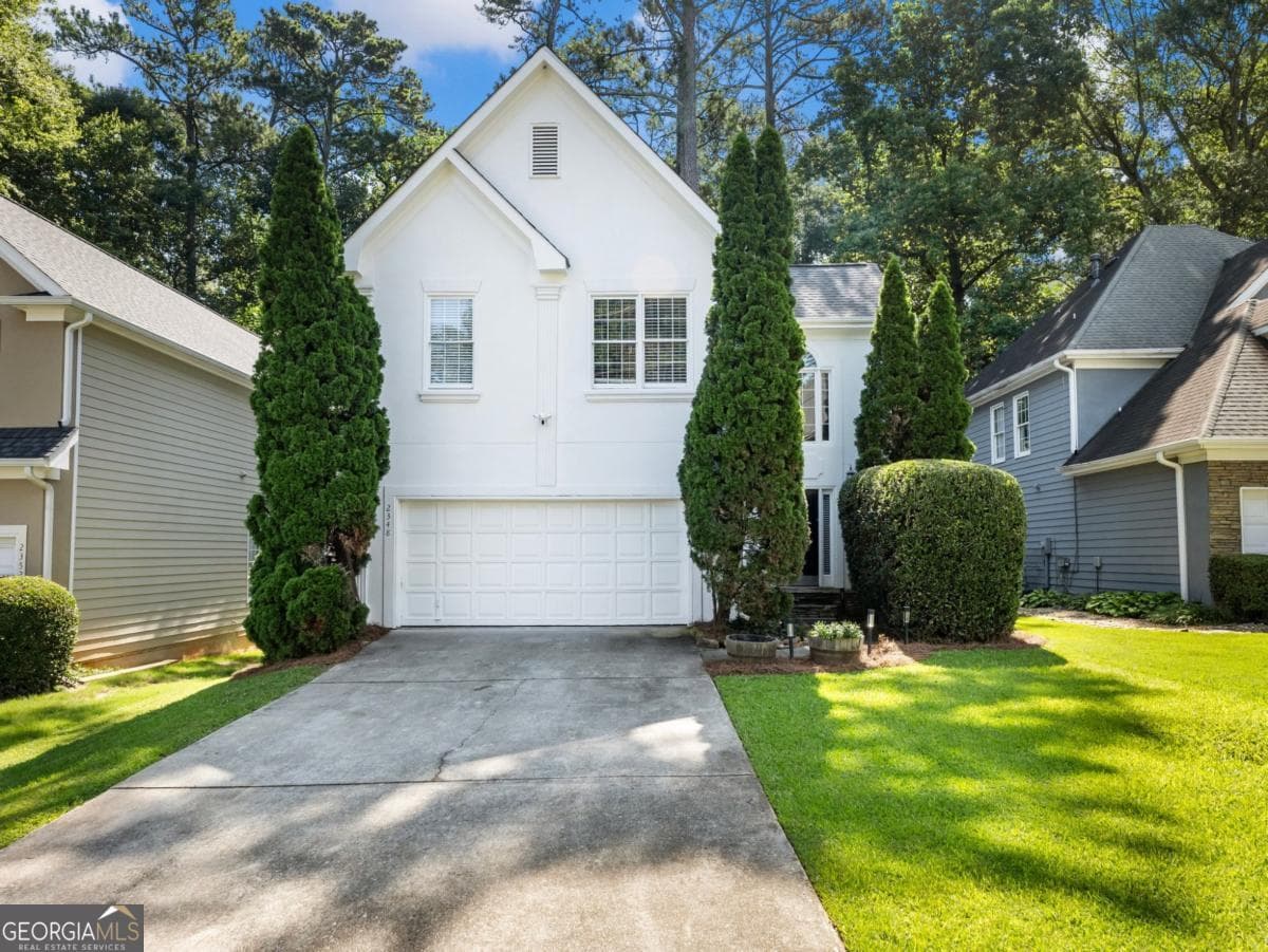 3 bedroom, 2.5 bathroom, 1,707 sq ft single family residence for sale at 2348 Logan Circle, Brookhaven, GA 30319 — photo 1 of 14