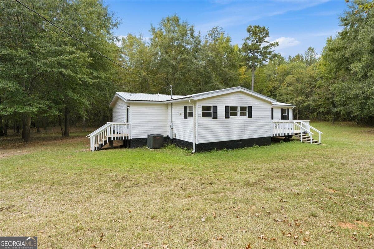 3 bedroom, 2 bathroom, 2,460 sq ft manufactured home,single family residence for sale at 308 Blounts Chapel Road, Haddock, GA 31033 — photo 3