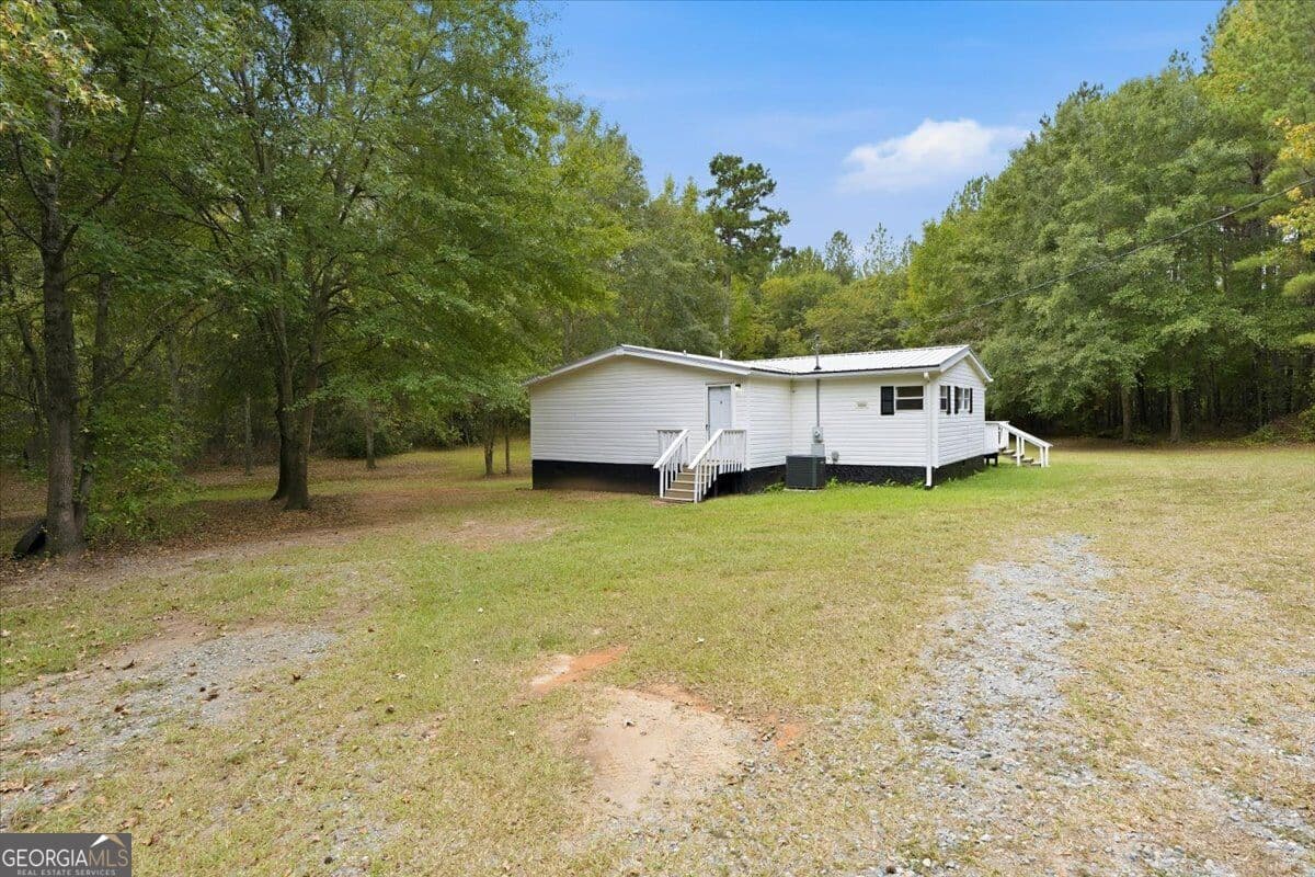 3 bedroom, 2 bathroom, 2,460 sq ft manufactured home,single family residence for sale at 308 Blounts Chapel Road, Haddock, GA 31033 — photo 4
