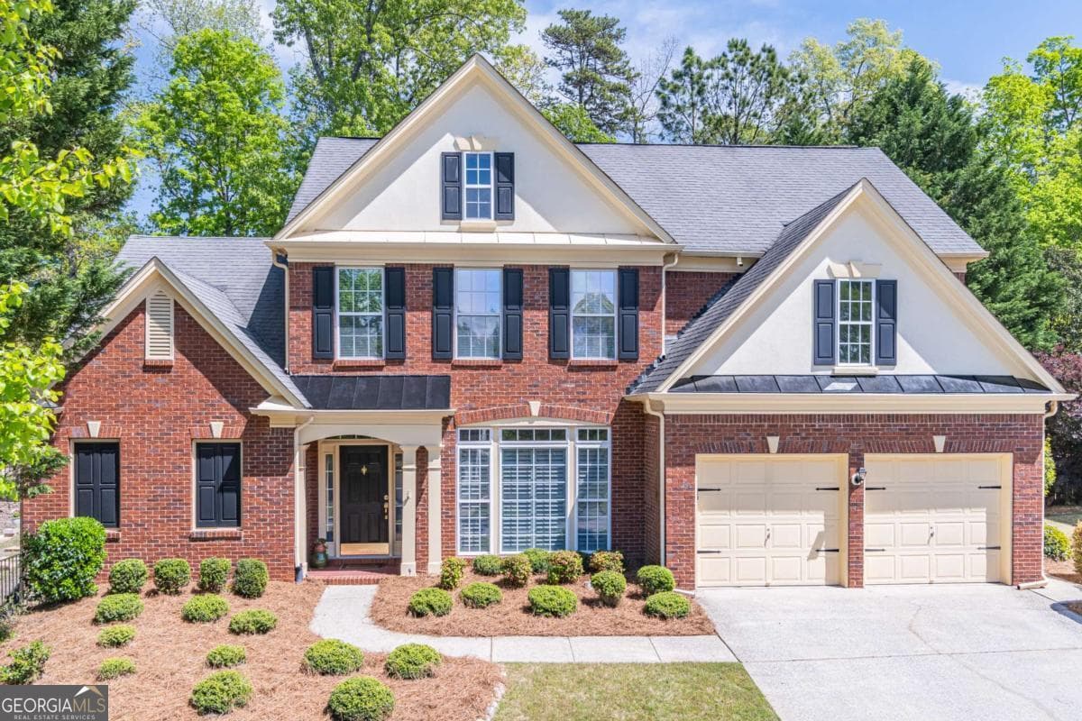 4 bedroom, 3.5 bathroom, 3,064 sq ft single family residence sold at 1685 Laleiah Drive, Cumming, GA 30041