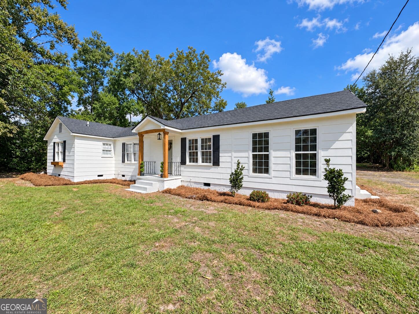 4 bedroom, 2 bathroom, 1,618 sq ft single family residence for sale at 711 5th Avenue, Twin City, GA 30471 — photo 3