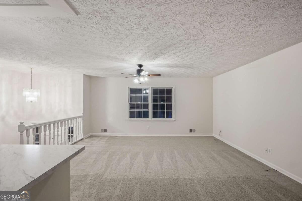 3 bedroom, 2 bathroom, 1,794 sq ft single family residence for sale at 4222 King James Court, Snellville, GA 30039 — photo 3