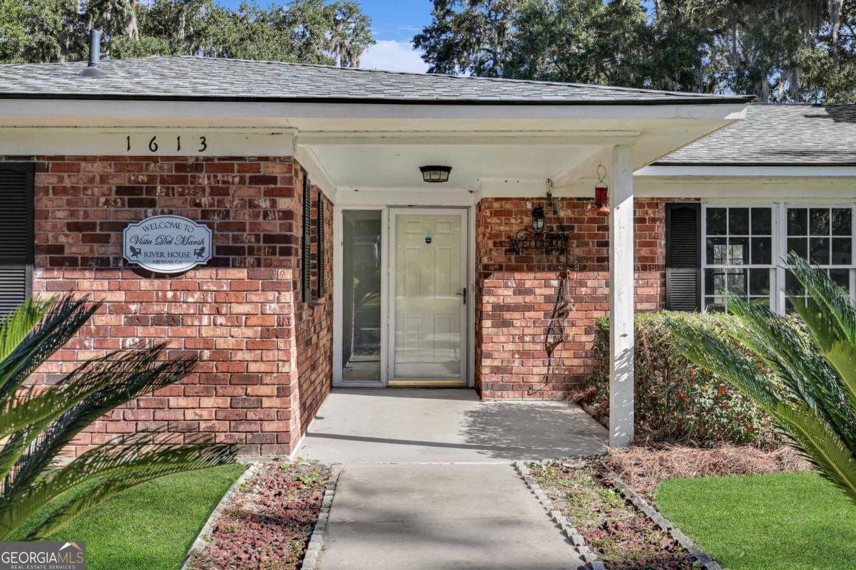4 bedroom, 3 bathroom single family residence for sale at 1613 Lake Drive, Midway, GA 31320 — photo 6