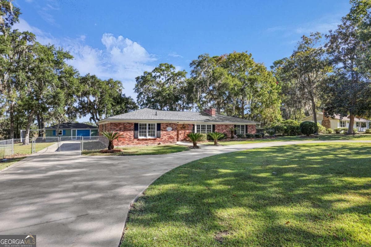 4 bedroom, 3 bathroom single family residence for sale at 1613 Lake Drive, Midway, GA 31320 — photo 7