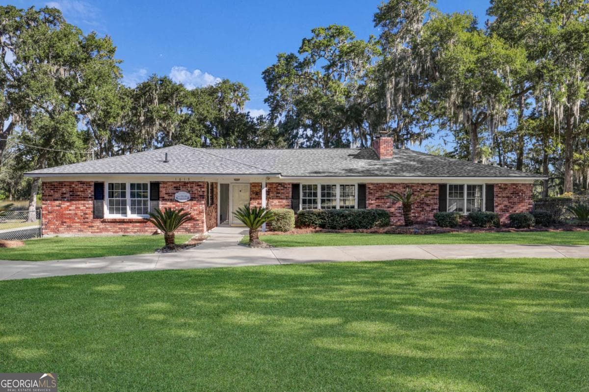 4 bedroom, 3 bathroom single family residence for sale at 1613 Lake Drive, Midway, GA 31320