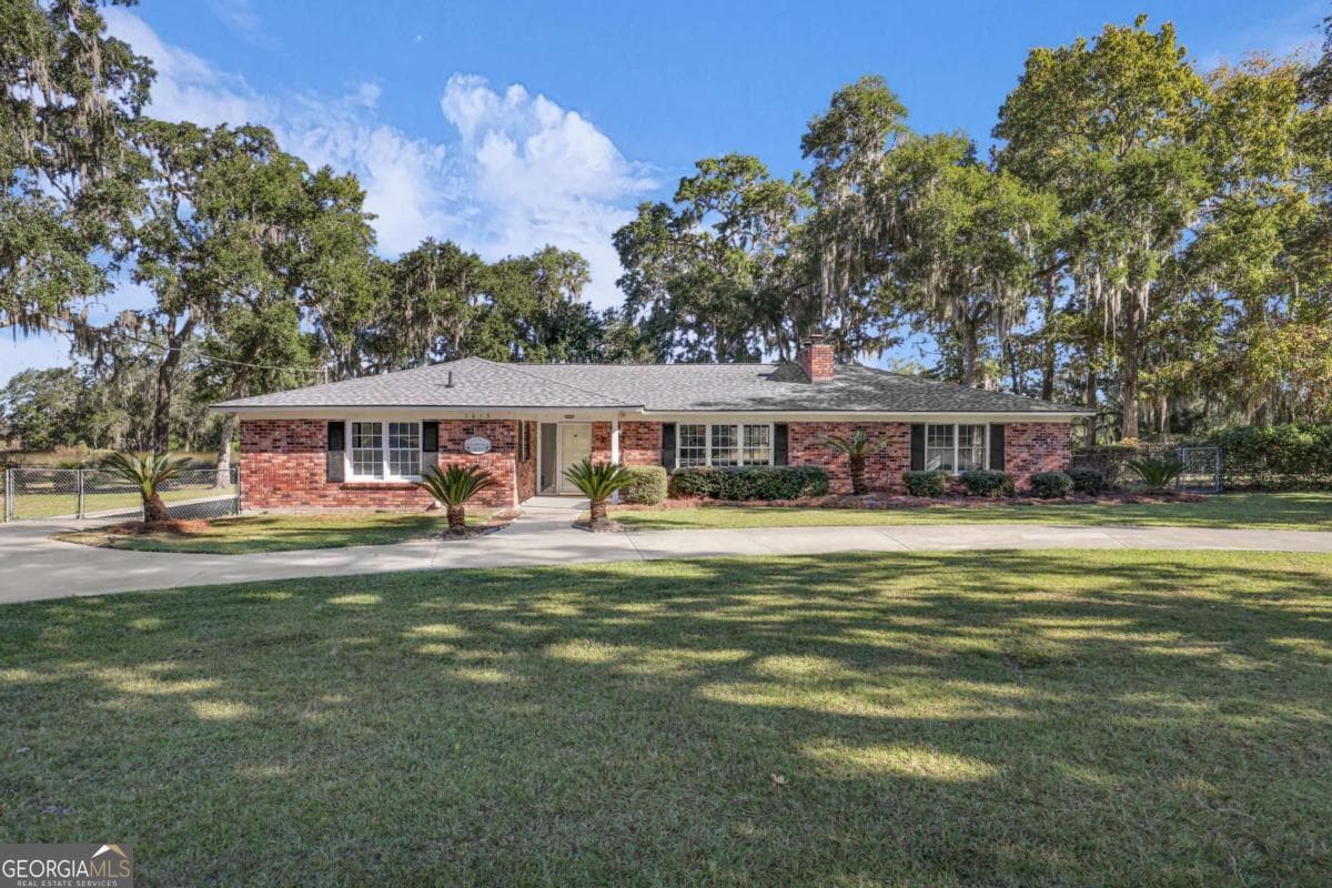 4 bedroom, 3 bathroom single family residence for sale at 1613 Lake Drive, Midway, GA 31320 — photo 5
