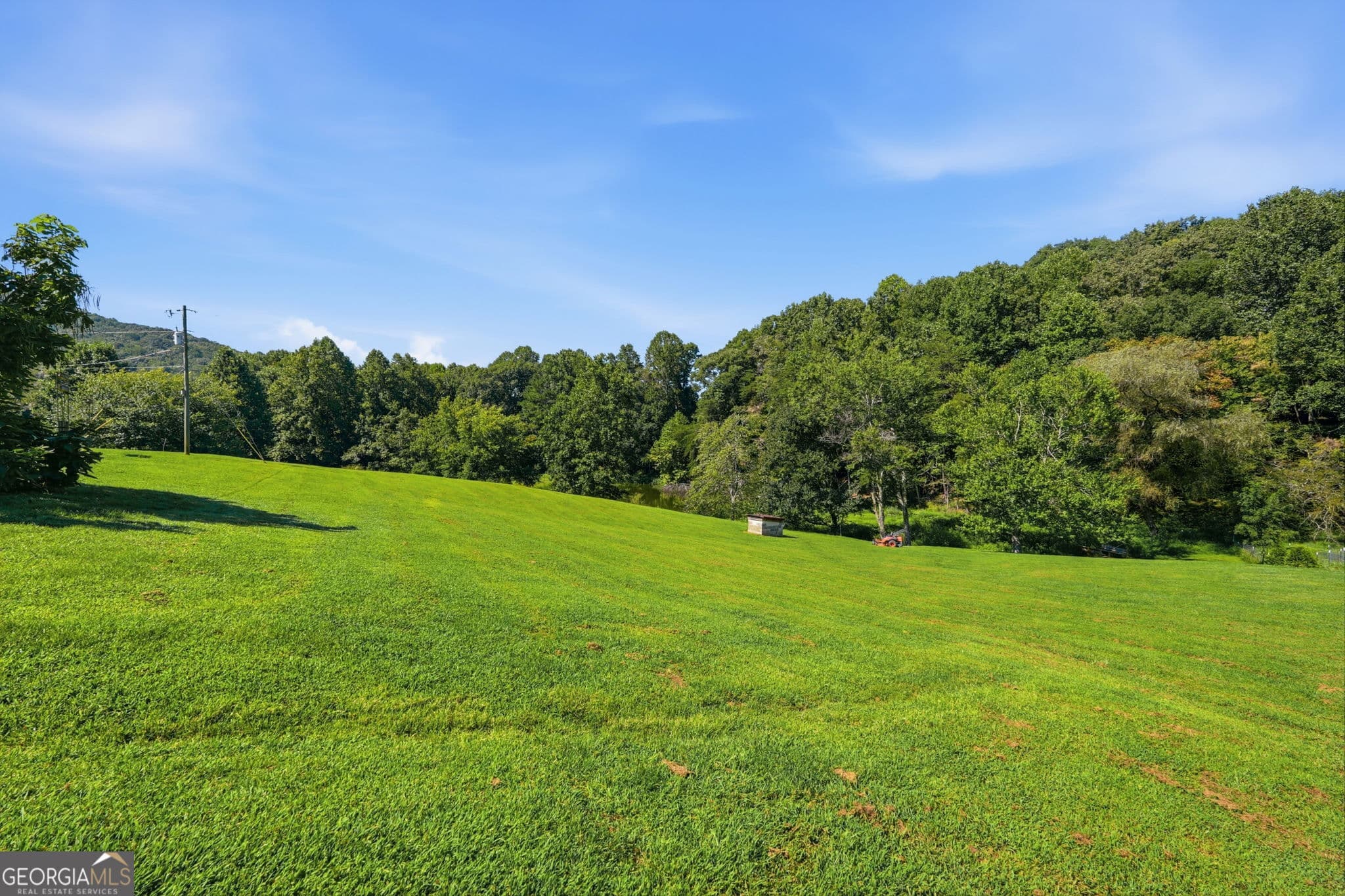 4 bedroom, 3 bathroom, 1,820 sq ft single family residence for sale at 1673 Rackley Road, Ellijay, GA 30536 — photo 3