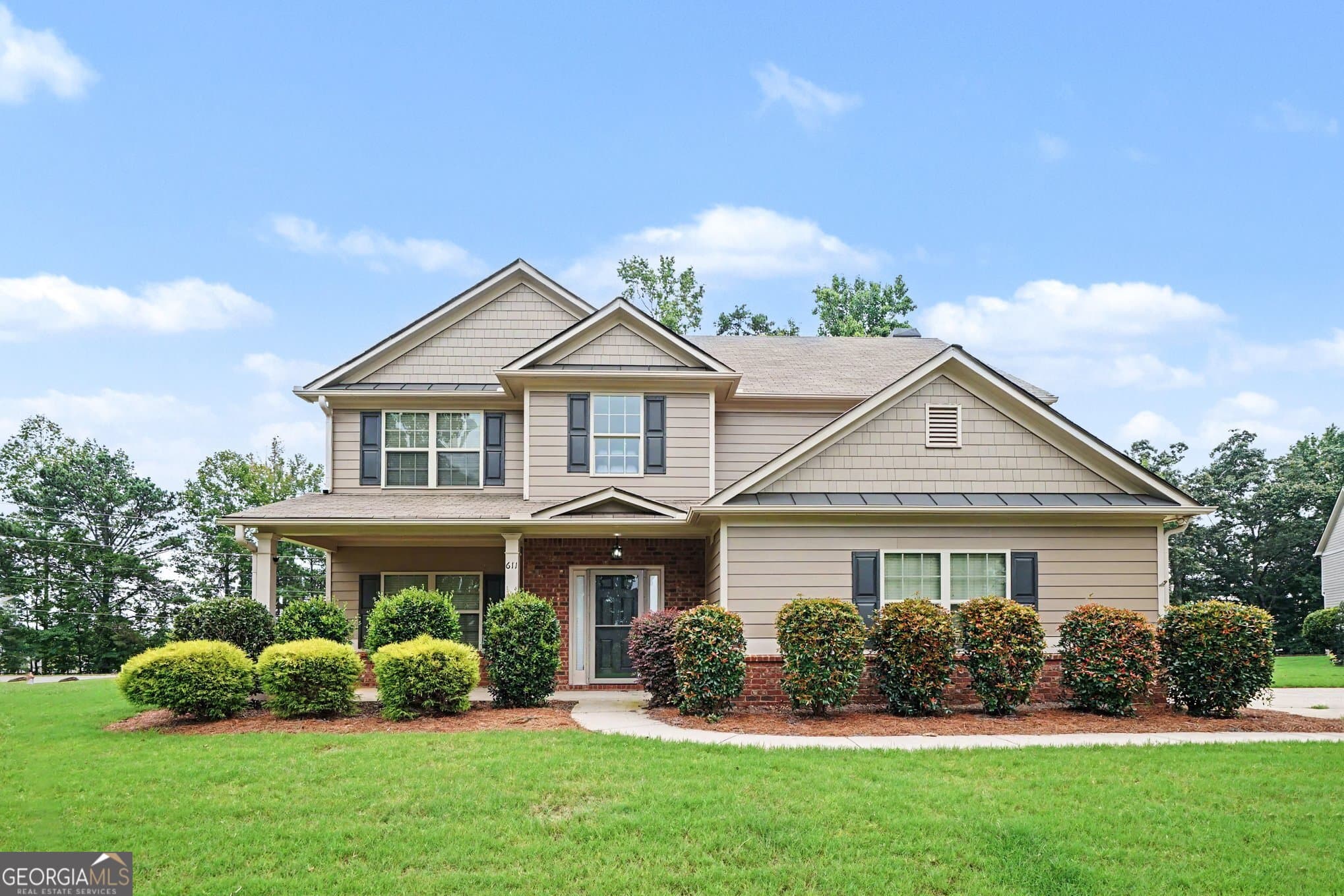 4 bedroom, 2.5 bathroom, 2,393 sq ft single family residence for sale at 611 Little Bluestem Trail, Hoschton, GA 30548