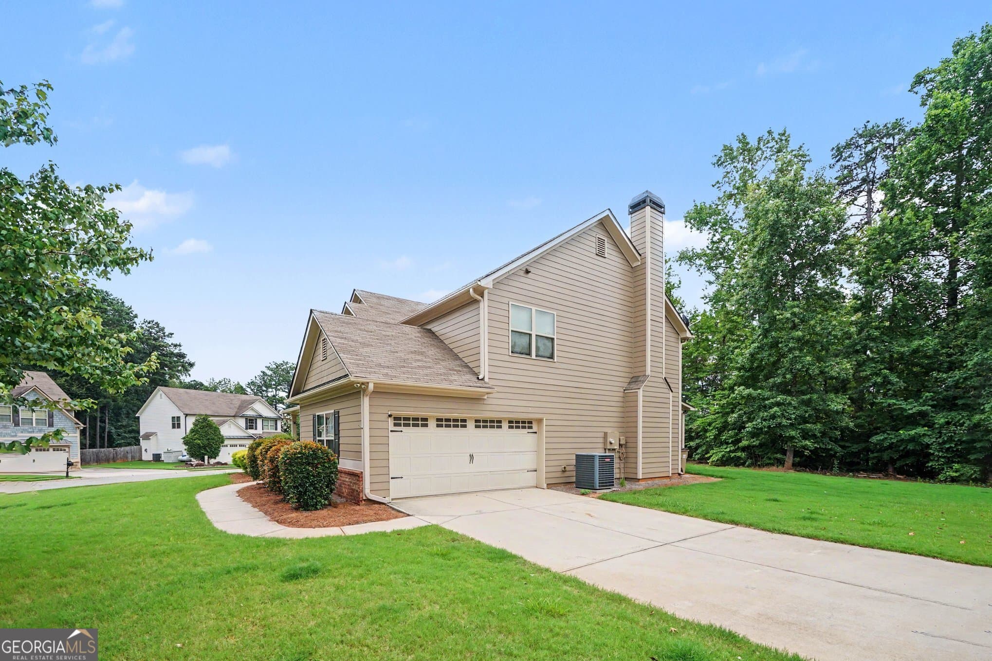 4 bedroom, 2.5 bathroom, 2,393 sq ft single family residence for sale at 611 Little Bluestem Trail, Hoschton, GA 30548 — photo 5